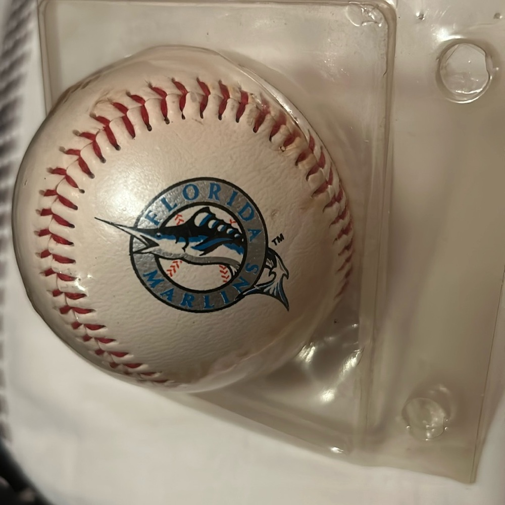 Vintage Florida Marlins baseball with swordfish in the silver circle.